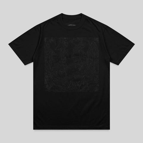 Black t-shirt with a textured square graphic centered on the chest.