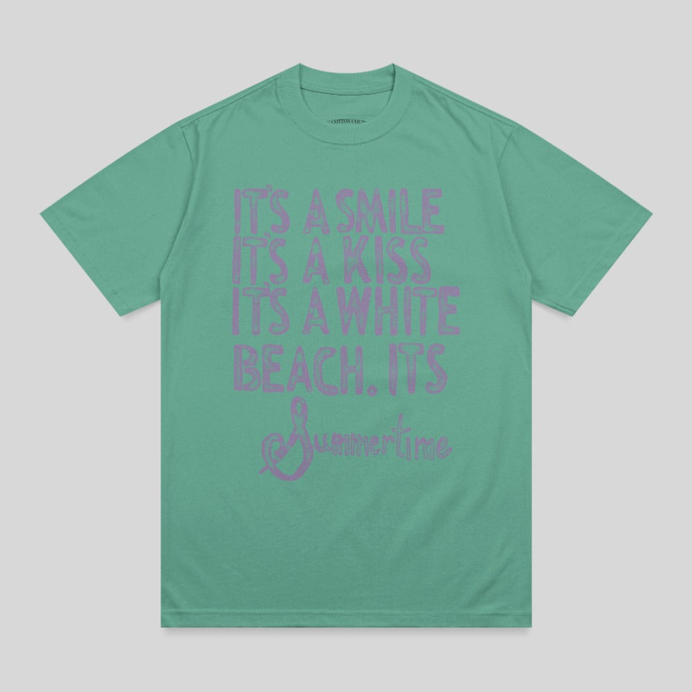 Green t-shirt with pink text reading "IT'S A SMILE, IT'S A KISS, IT'S A WHITE BEACH, IT'S Summertime."