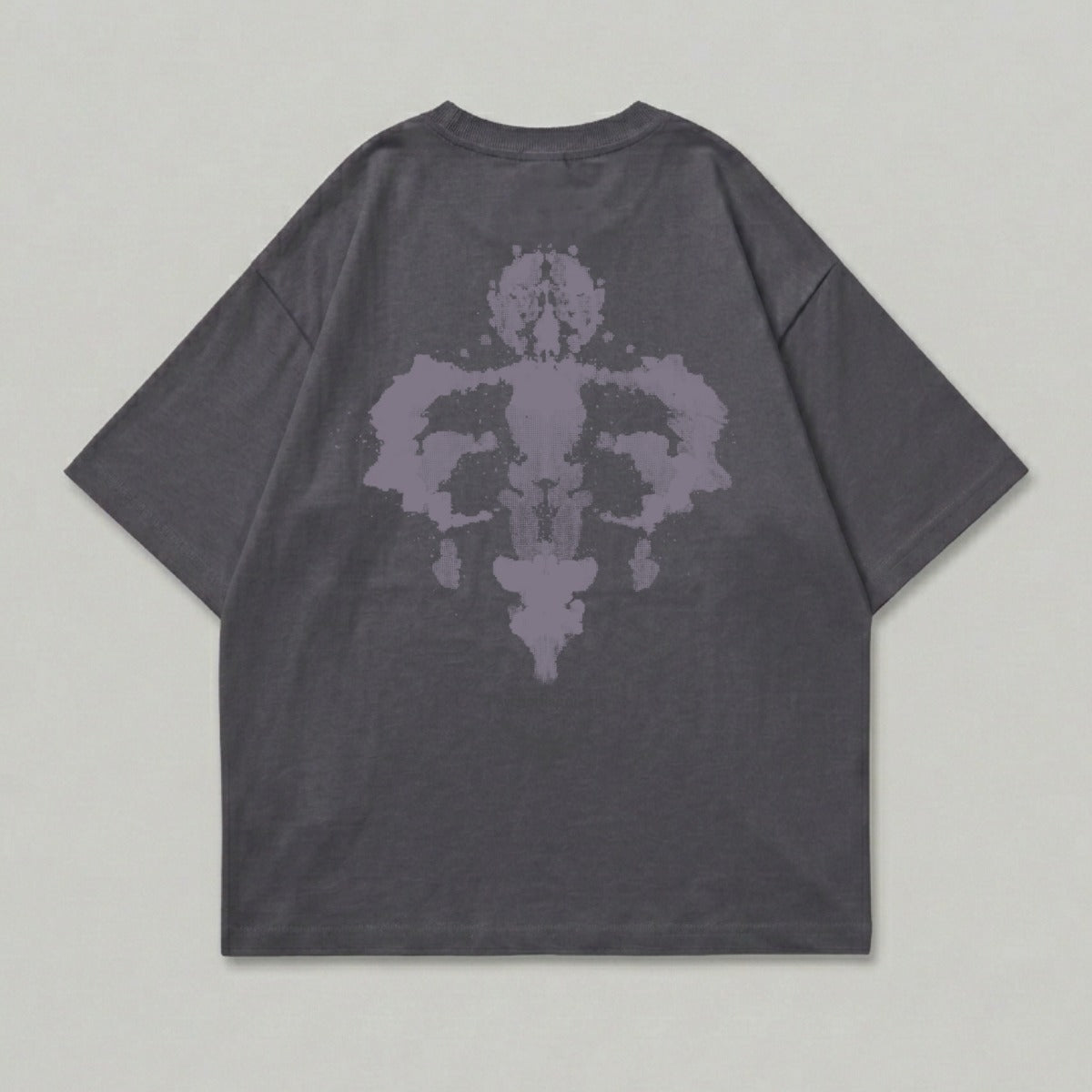 Dark grey t-shirt with symmetrical purple ink-blot design on back.