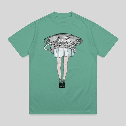 T-shirt graphic of a woman's legs emerging from an overturned teacup.
