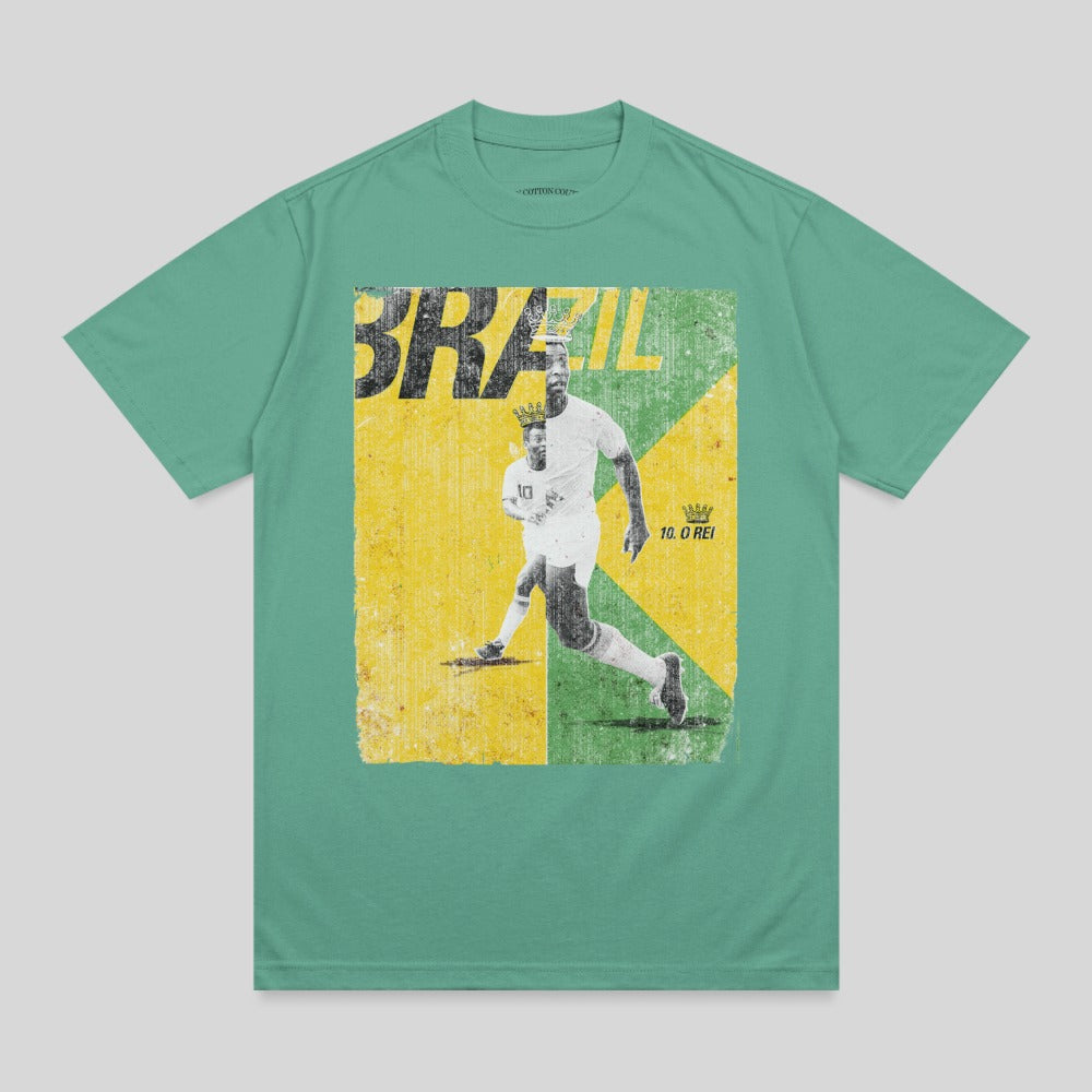 T-shirt featuring distressed graphic of soccer player Pelé running, with "BRAZIL 10 O REI" text.