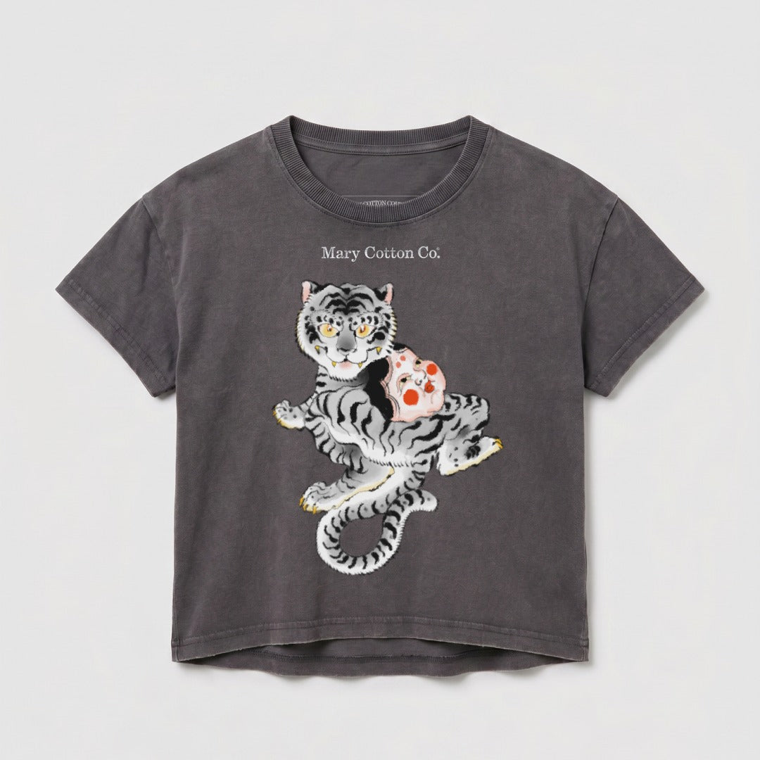 T-shirt with a graphic of a stylized tiger holding a playful mask.