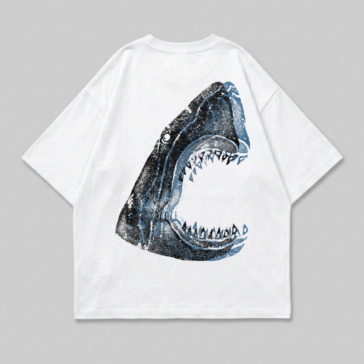 White t-shirt with a close-up graphic of a shark's open mouth.