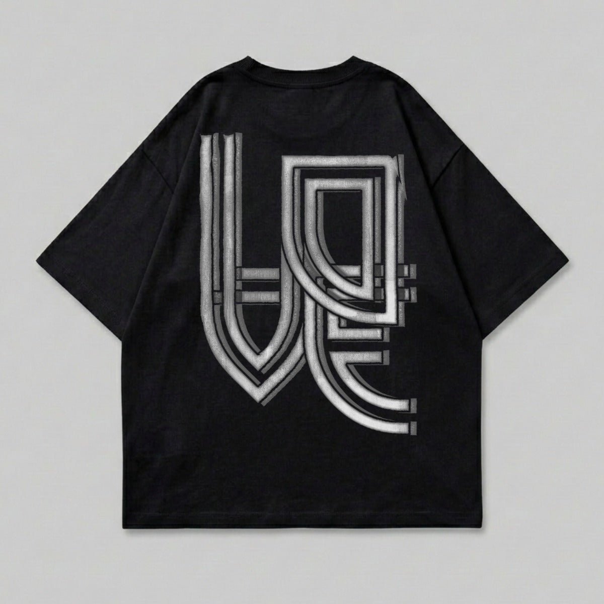 Black t-shirt with white abstract graphic design on back.