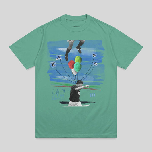 Green t-shirt with graphic of soccer player Lionel Messi with balloons and abstract art.