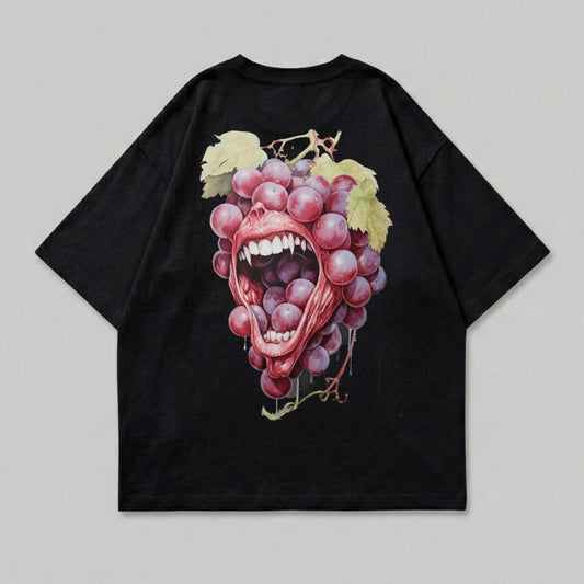 Black t-shirt with a graphic of a monstrous cluster of grapes with an open mouth.