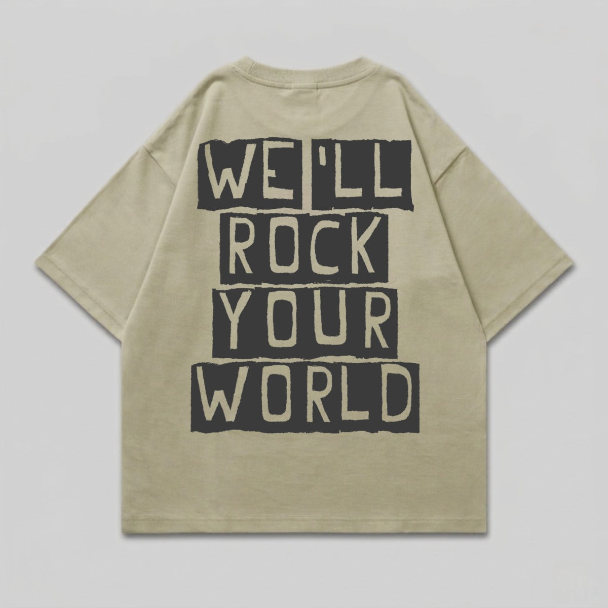 Tan t-shirt with bold black text that reads "WE'LL ROCK YOUR WORLD".