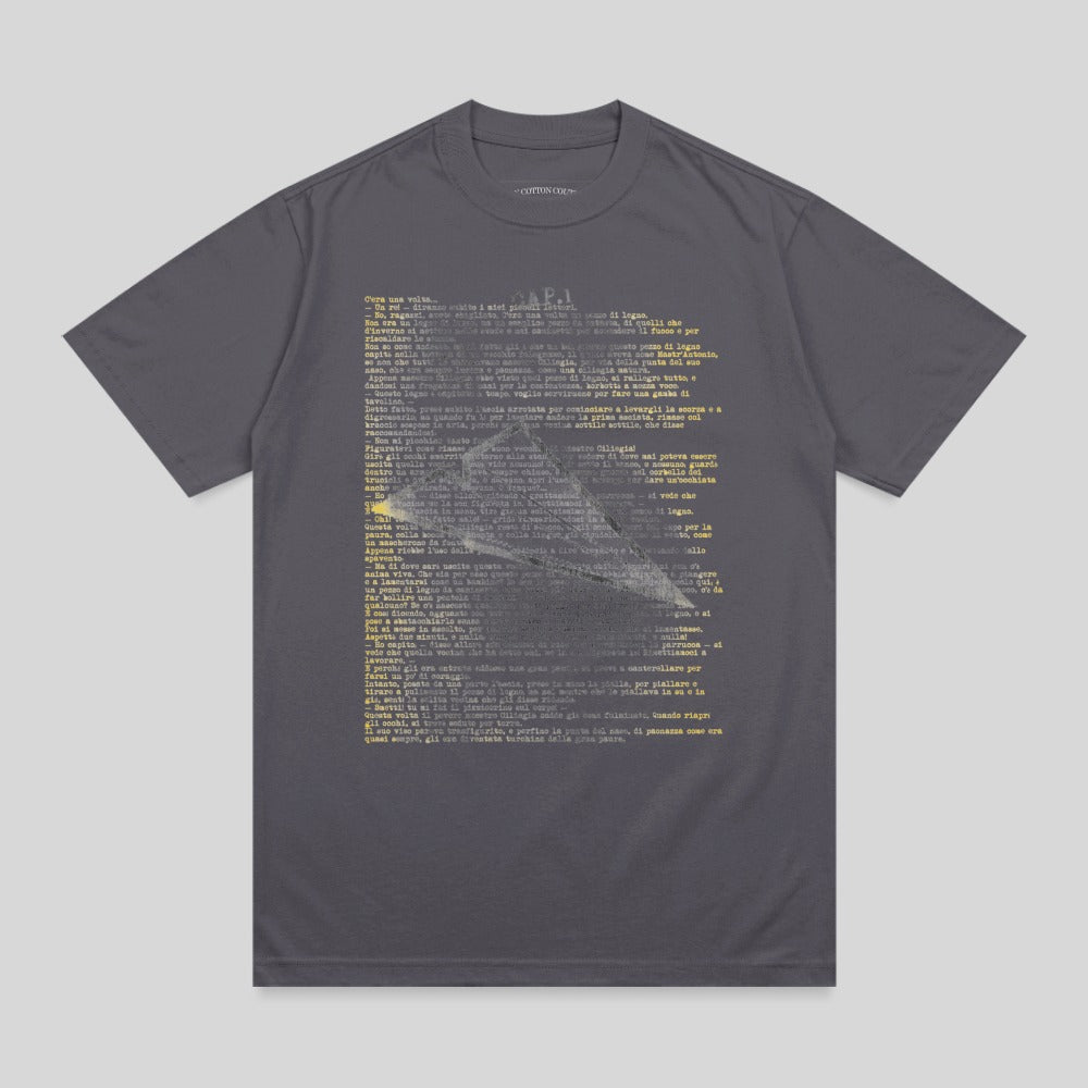T-shirt with block of text in dark gray on dark gray fabric.