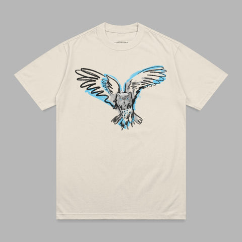 Cream t-shirt with a sketch of an owl in flight with blue and black ink.