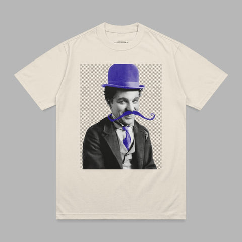 Charlie Chaplin in bowler hat and mustache on cream t-shirt.