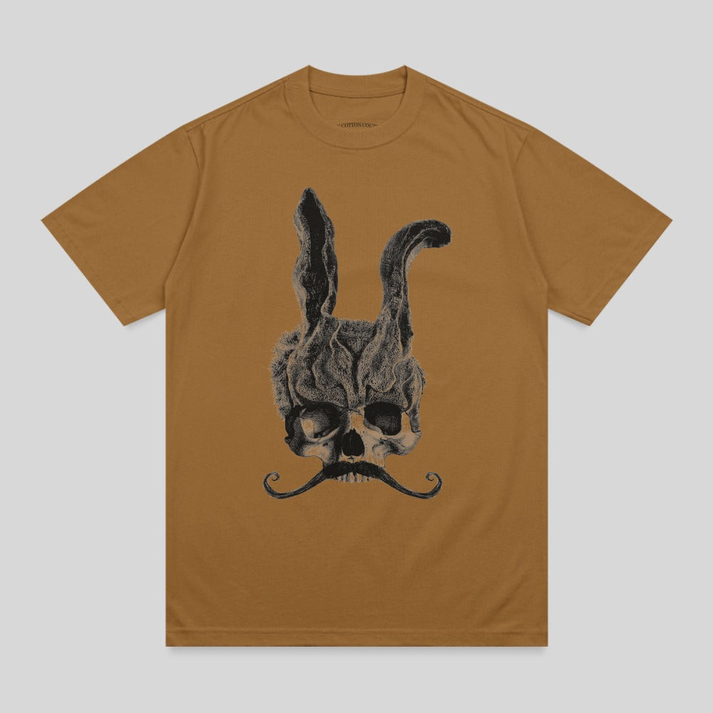 Brown t-shirt with a smoky skull wearing a mustache and bunny ears.