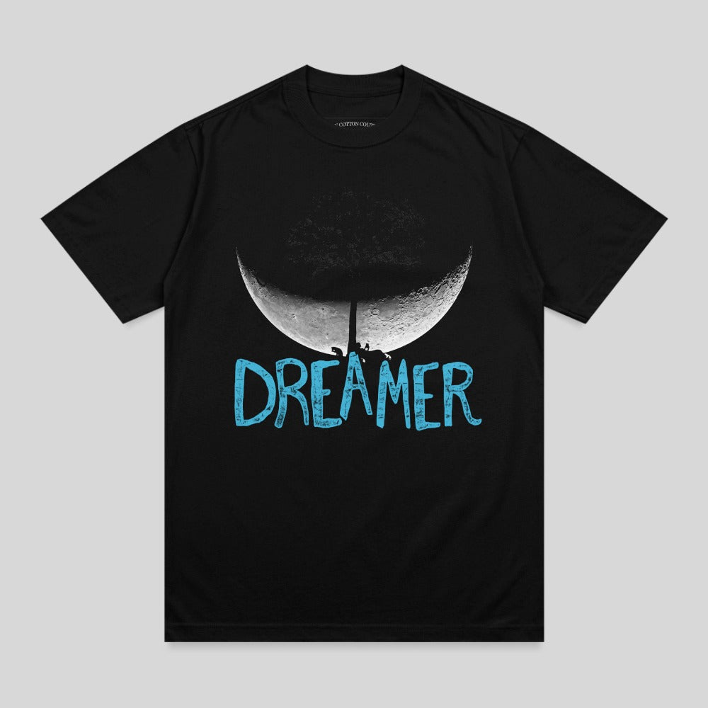 Black t-shirt with a crescent moon, tree, and "DREAMER" text.